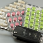 prescription next to car keys as part of dui concept prescription next to car keys as part of dui concept