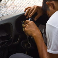 Boy alseep at on the wheel Boy alseep at on the wheel