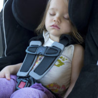 Toddler sleeping in car seat