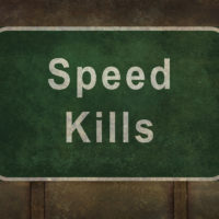 Speed Kills highway roadside sign Speed Kills highway roadside sign