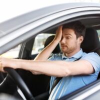 tired sleepy man or driver driving car tired sleepy man or driver driving car
