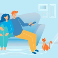 Young Couple watching TV . Young Couple watching TV .