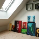 Home interior. Art collection in modern attic / loft apartment.