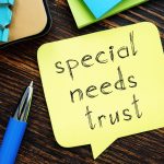 Special needs trust is shown on a photo using the text Special needs trust is shown on a photo using the text