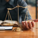 Attorney reading law code, studying constitution to protect human rights closeup, Male lawyer or judge working with Law books, gavel Attorney reading law code, studying constitution to protect human rights closeup, Male lawyer or judge working with Law books, gavel