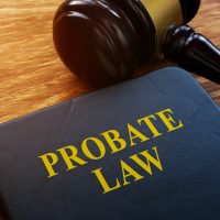 Probate Law book and wooden gavel in the court. Probate Law book and wooden gavel in the court.